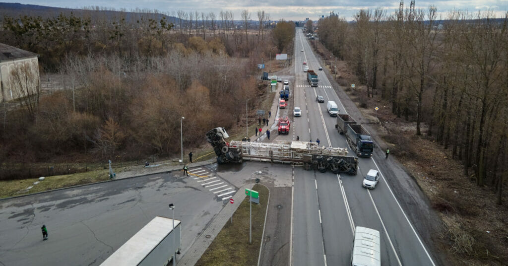 An aerial view of a truck on a highway, possibly involving a personal injury incident.