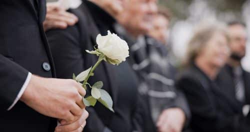 Mourning with Flower in hand